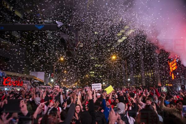 Toronto Raptors fans react after the team's 100-94 game six win over the Milwaukee Bucks to become the NBA Eastern Conference champions outside the Scotiabank Arena, in Toronto on Saturday, May 25, 2019. THE CANADIAN PRESS/Chris Young