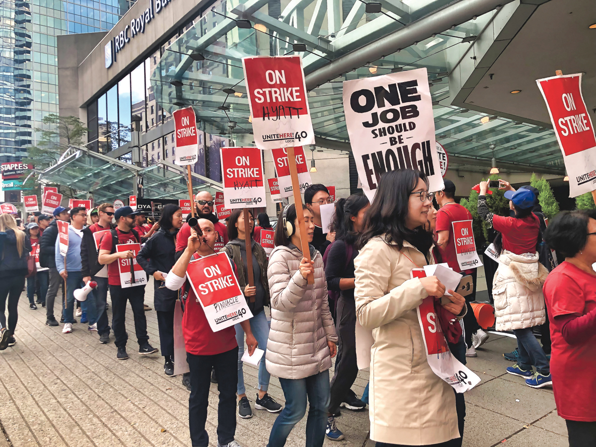 ■有学者指工人意识到要争取公平及合理的回报。图为酒店工人较早前举行罢工。 
资料图片