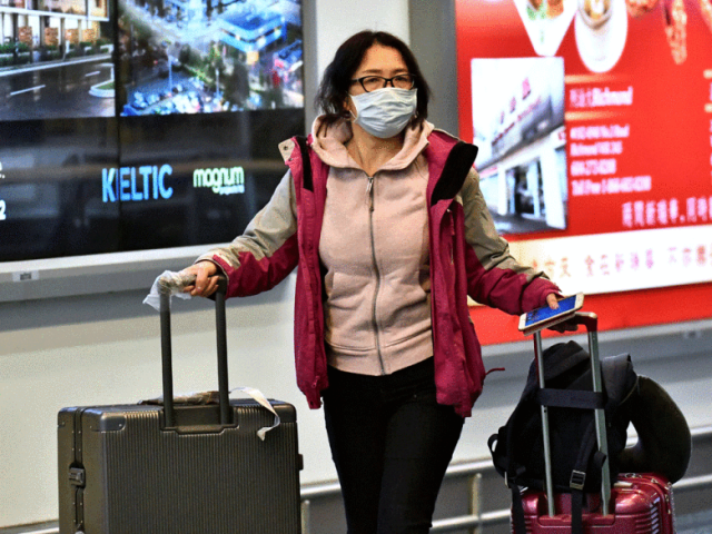 Image result for Volunteers on WeChat drop off groceries for people under self-quarantine and facilitate 'no-touch' pick-ups from the airport