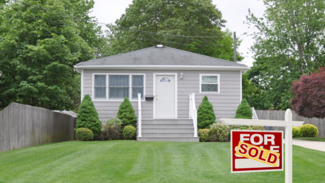 A sold sign is seen outside a home in this stock image from the B.C. ombudsperson's report on tax sales in the province.