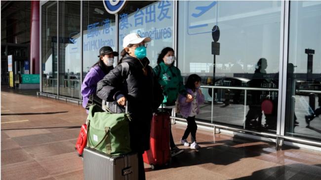 加拿大密切关注中国春运 恐引发新变异