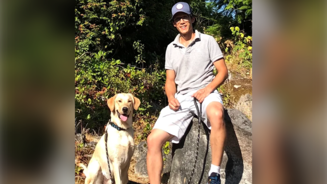 This photo shows Keen Lau and his Labrador. Lau is being identified by West Vancouver's mayor as the man who drowned trying to rescue his dog on May 19, 2023. (Image credit: keenlauforcouncil.ca)