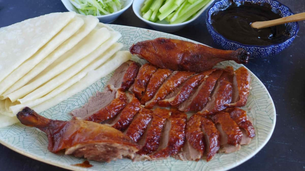 北京鸭是中国菜中不可缺席的佳肴美食。 资料图片